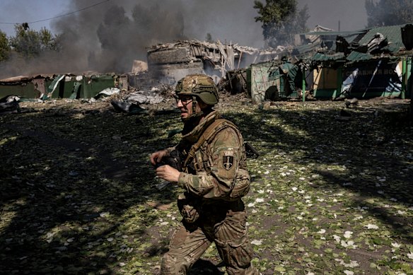 A soldier from Ukraine’s 33rd Separate Mechanised Brigade at the scene where a Russian glide bomb struck minutes earlier near Pokrovsk last week.