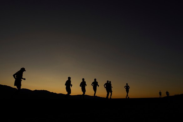 Danny Westergaard, leading the centre group of runners, competes during the Badwater 135 Ultramarathon on July 7 near Badwater Basin in Death Valley National Park, California.