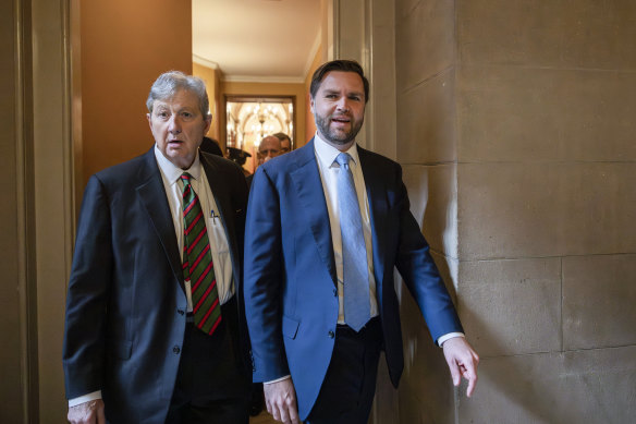 Vice President-elect JD Vance, right, and Senator John Kennedy, left, walk out of a meeting with Attorney General nominee former Representative Matt Gaetz at the Capitol.