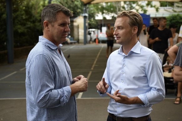 Mike Baird with Manly MP James Griffin (right) on Saturday.