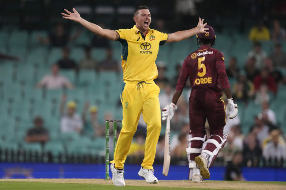 Australia’s Josh Hazlewood, left, successfully appeals for a LBW decision on the West Indies’ Matthew Forde, right, during their one day international cricket match in Sydney