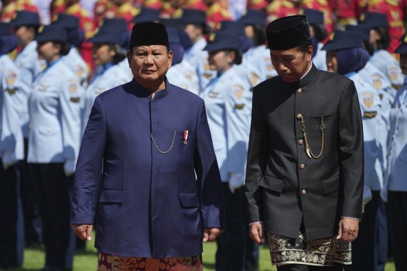 Indonesian President Prabowo Subianto (left) with predecessor Joko Widodo during the handover ceremony at Merdeka Palace in Jakarta on Sunday.