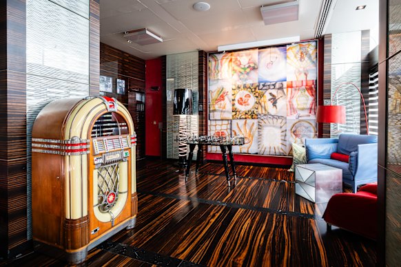 The lobby is packed with artworks and  artefacts including Edo-era samurai armour and a glossy red baby grand piano.