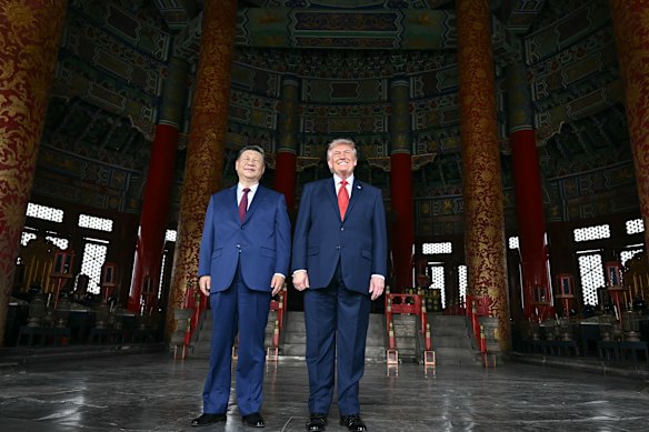 Trump poses alongside Xi inside the Temple of Heaven.