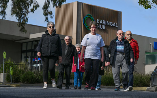 Much loved group: Members of Karingal Hub Walkers outside the shopping centre, in Frankston, this week.