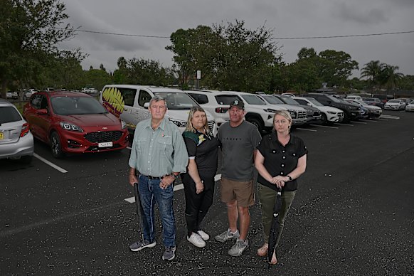 Blacktown councillor Bob Fitzgerald (left), pictured with residents Louise Lyon, Matt Taylor and Sam Dooley at the Eastern Creek Quarter shopping complex.