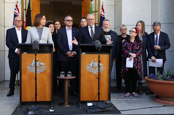 Prime Minister Anthony Albanese during a press conference at Parliament House in Canberra, alongside Communications Minister Anika Wells.