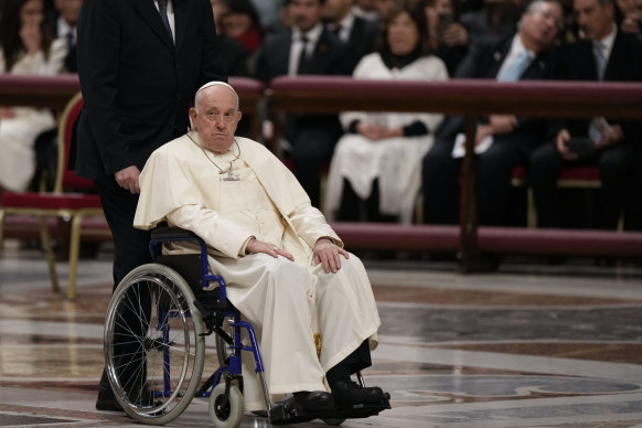 Pope Francis arrives in St Peter’s Basilica to attend a mass for the Virgin Mary of Guadalupe at the Vatican on Tuesday.