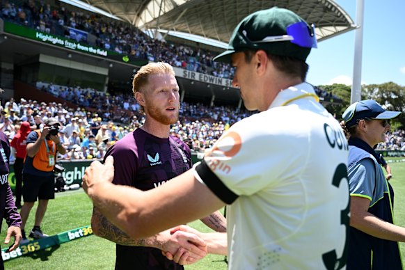 Tough times: England captain Ben Stokes shakes hands with Pat Cummins.