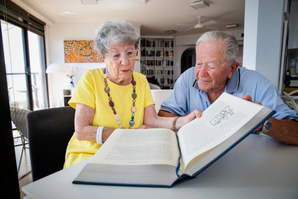 Ruth Wilson, 88, with her husband of 67 years, David, reading Austen aloud.