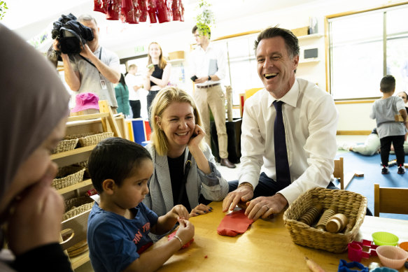 NSW Labor Leader Chris Minns and his wife, Anna, visit an early learning centre in Condell Park on the campaign trail.