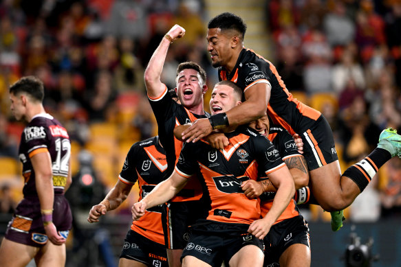 Adam Doueihi celebrates scoring a try.