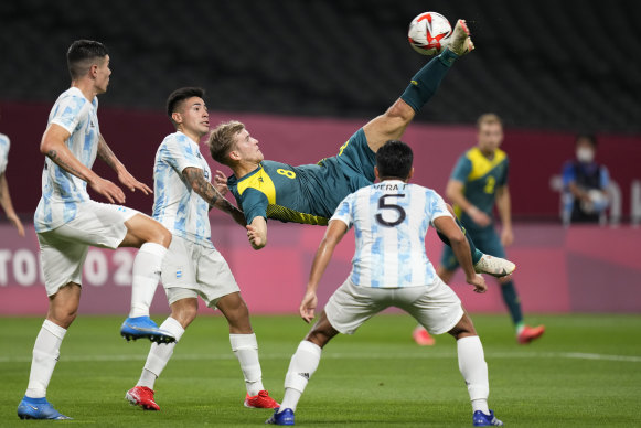 Riley McGree attempts a spectacular shot on goal in Australia’s win over Argentina at the Tokyo Olympics.