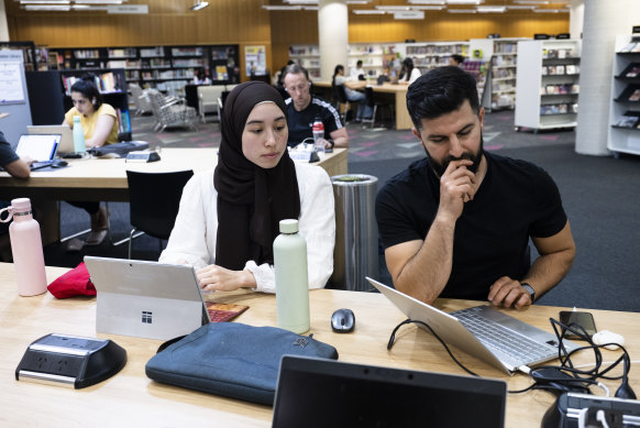 Mia Atkinson and Sharif Barez had to use the internet at Blacktown library. 