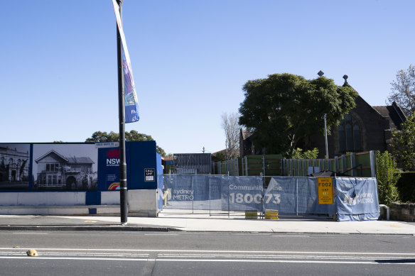 The metro station at Five Dock is under construction on Great North Road. Next door is the St Alban’s Anglican Church.