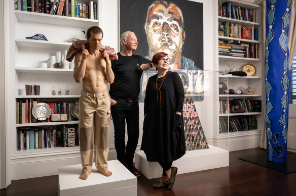 Rob and Patricia Postema with their Sam jinks sculpture, <i>Carcass Bearer</i>.