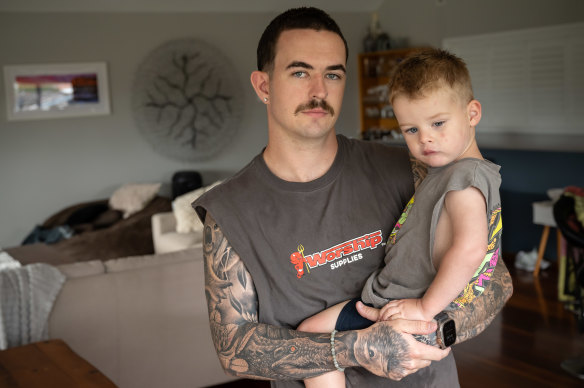 Daniel English, pictured with his son Sage, is selling an engagement ring on Facebook Marketplace.