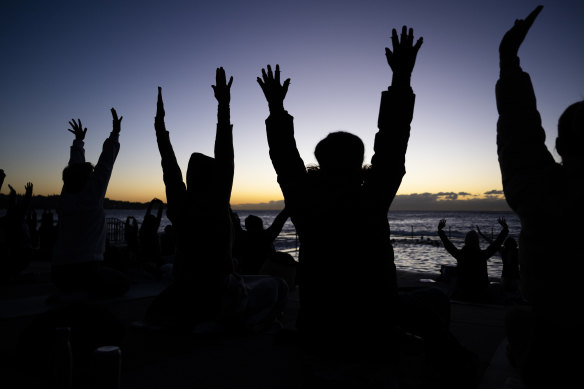 People celebrate the winter solstice at Wylie’s Baths in Sydney with a dawn swim, meditation and a yoga class.