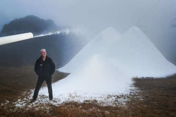 Mount Buller and Mount Stirling Alpine Management chief executive Mark Bennetts watching the stream of machine-made snow. 