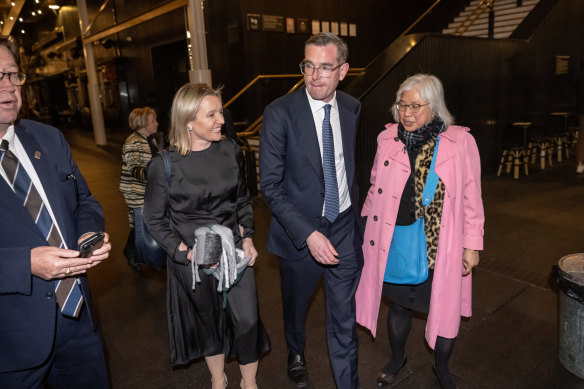 Perrottet arrives at the Ivy on Tuesday night with his wife Helen.