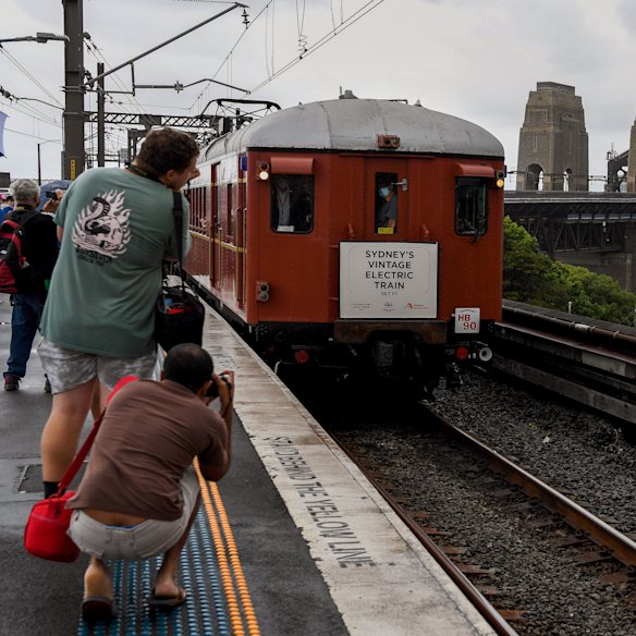 A “Red Rattler” departs Milsons Point to cross the Harbour Bridge in 2022 - running late again. 