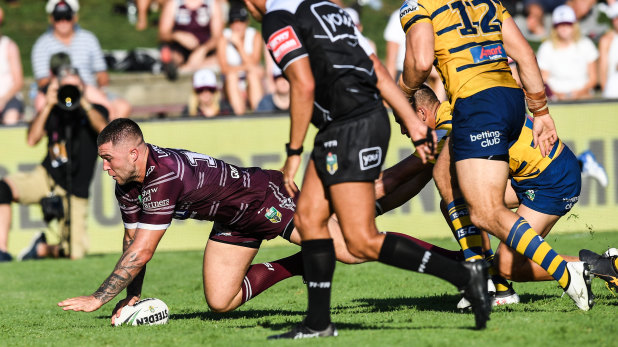 Procession: Curtis Sironen scores another try for Manly as the Eels wilt at Lottoland.