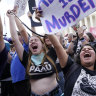 People celebrate the Supreme Court’s decision to end the constitutional protections for abortion.