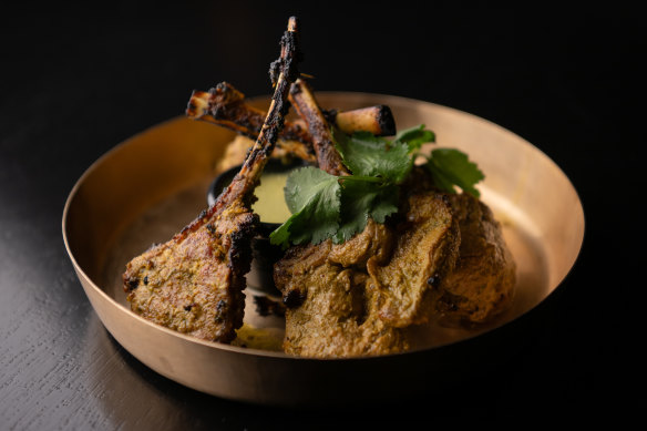 Hariyali lamb chops pick up a smokiness from their spell in the tandoor.