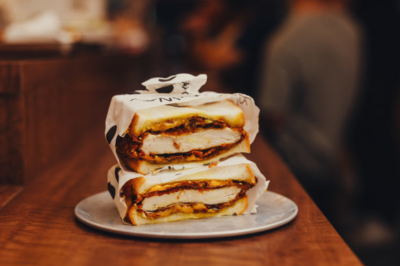 Sesame fried chicken, cheese, pickled zucchini and curry mayo sandwich.