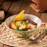 Yentafo pink noodle soup.