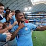 Douglas Costa with fans at a Sydney FC game at Allianz Stadium in April.