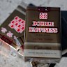 Illicit Double Happiness cigarettes, which are sold for as low as $13 in stores.