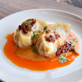 Hand-rolled shiitake momo dumplings.