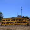 A ‘We are not Sydney’s dumping ground’ banner on the outskirts of Parkes opposing the proposed Parkes Energy From Waste site. The Wiradyuri people alongside many of Parkes residents oppose the proposed $1.5 billion incinerator that will have the capacity to process 600,000 tonnes of Sydney waste per year. Parkes, NSW. December 5, 2025. Photo: Kate Geraghty 