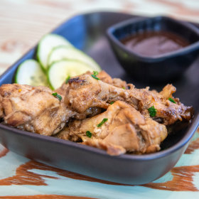 Chicken drumettes with house-made hot sauce.