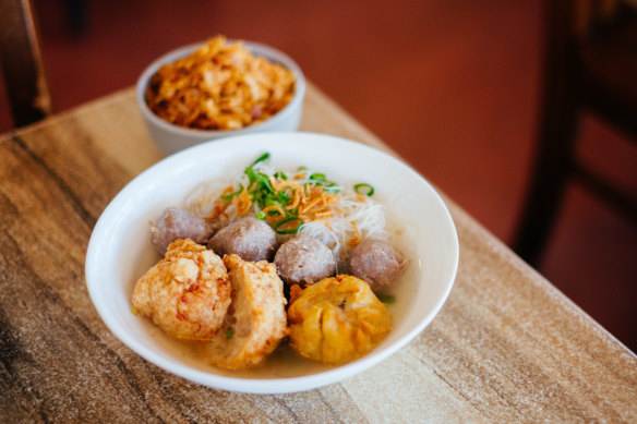 Bakso malang bihun soup, bakso beef balls with siu mai dumplings and deep fried chicken prawn balls and rice noodles.