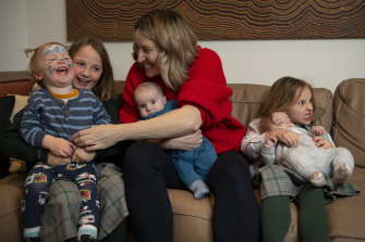 Jana Pittman with her children, from left, Charlie, Emily, twins Quinlan and Willow and Jemima, at home in Beecroft. 