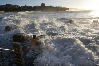 A swimmer braves the rough seas at Coogee on Monday.