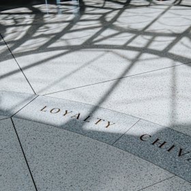 Light filters through the oculus to illuminate words used to mark the values of Australia’s defence force personnel.