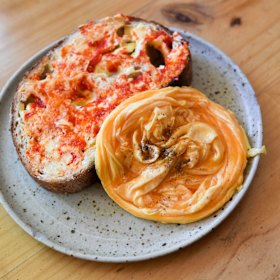 Scrambled eggs with house-made chili toast.