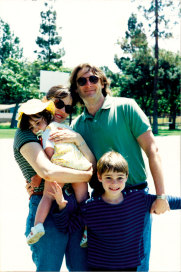 Jocelyn Moorhouse and PJ Hogan with their children Lily and Spike in Santa Monica in 1996.