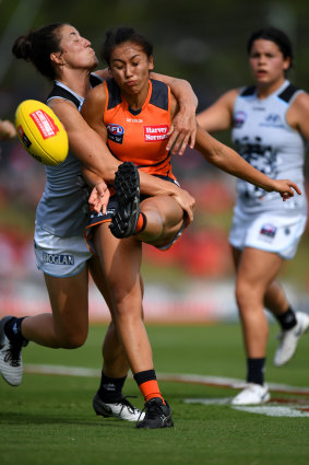 Best: Rebecca Beeson gets a kick away under pressure against Carlton in round three.