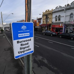 A Commonwealth government sign promoting a “signal upgrade” in Burwood Road, Hawthorn.