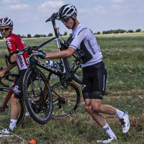 Detour: Chris Froome gets back on the road after ploughing into a field.