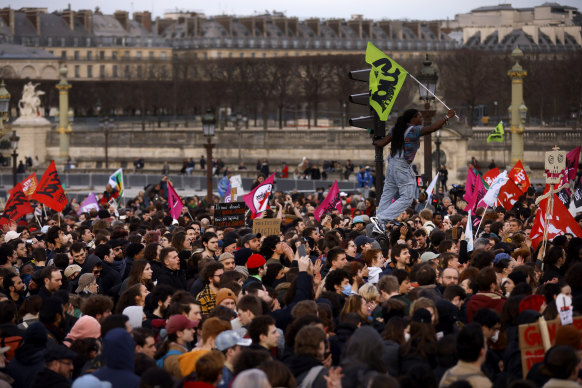 Protesters gather at the Place de la Concorde near the National Assembly in Paris.