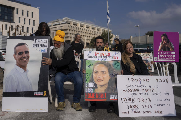 Families and supporters of Israeli hostages held by Hamas in Gaza, protest outside Prime Minister Benjamin Netanyahu’s office in Jerusalem on Sunday.