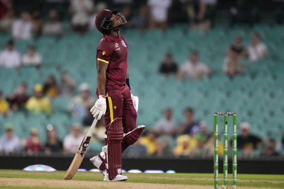 The West Indies’ Keacy Carty walks off after hie is caught behind by Australia during their one day international cricket match in Sydney, Sunday, Feb. 4, 2024.