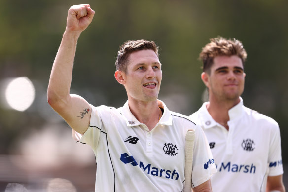 Cameron Bancroft and Teague Wyllie walk from the field after Western Australia win the Sheffield Shield final against Victoria at the WACA on Sunday. 