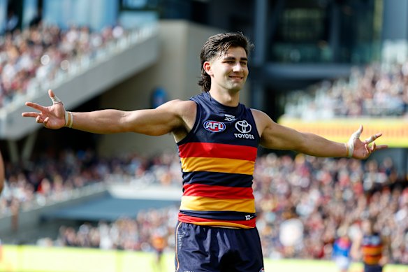 Josh Rachele of the Crows celebrates a goal.