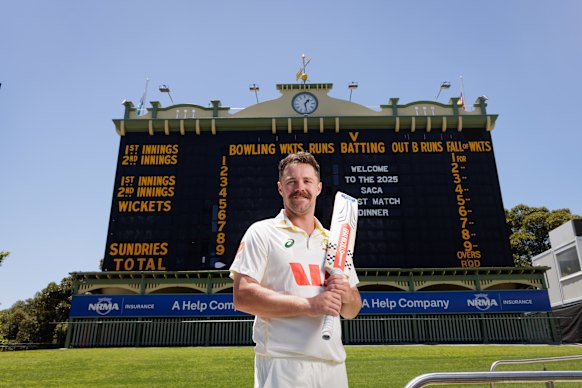 Head in front of the famous Adelaide Oval scoreboard.